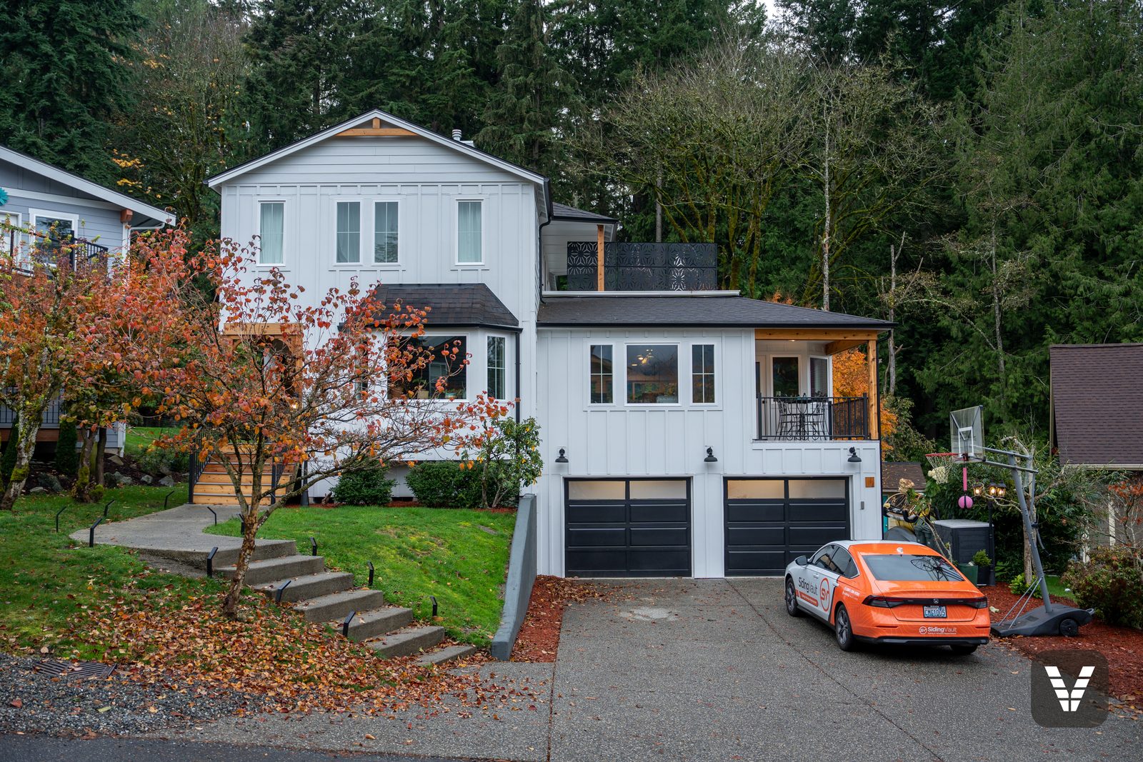 Street view of the finished Hardie remodel in autumn — Siding & Window Vault project in Bellingham, WA