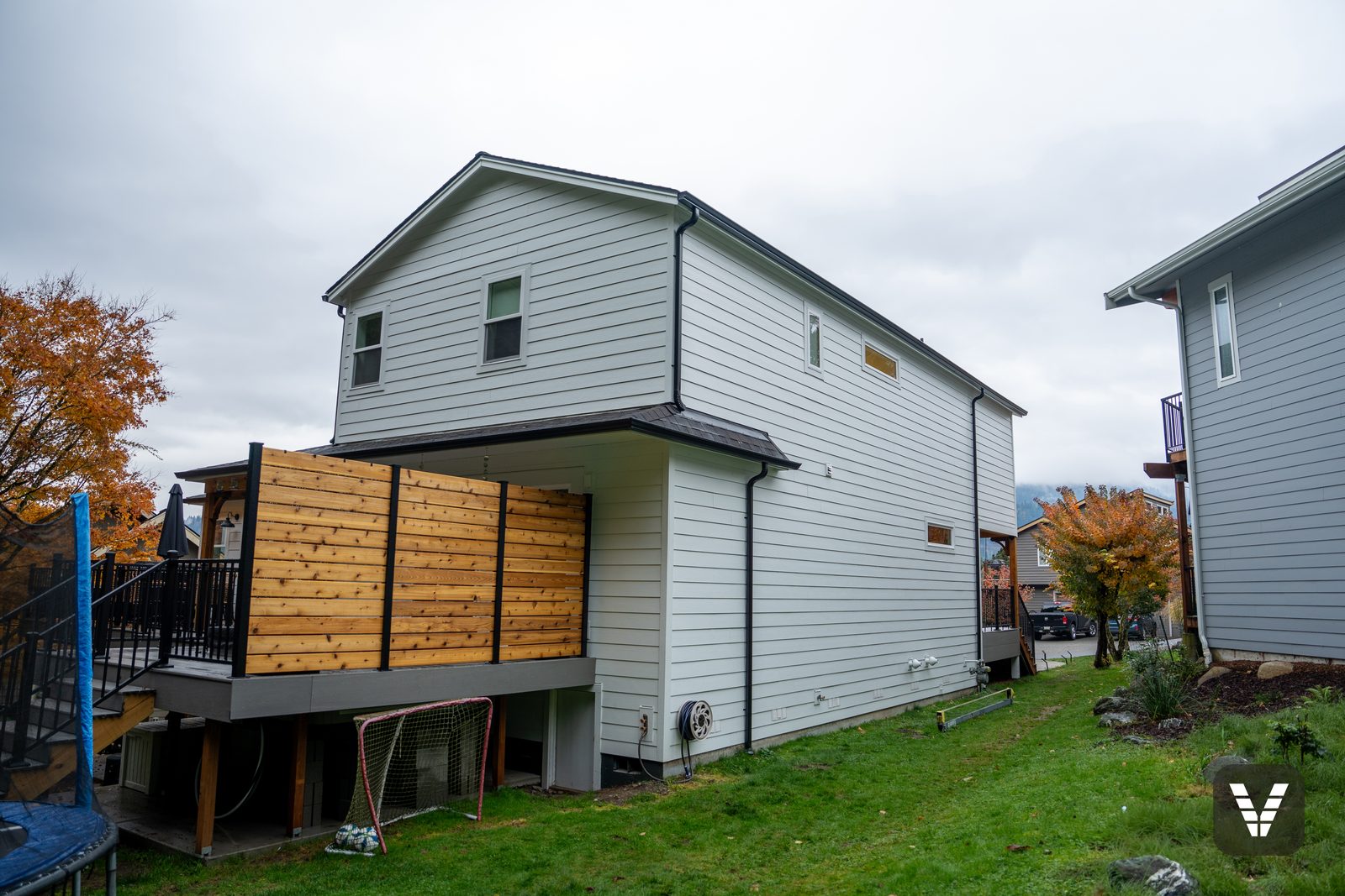 Rear corner in crisp HardiePlank lap with new trim lines — Siding & Window Vault project in Bellingham, WA