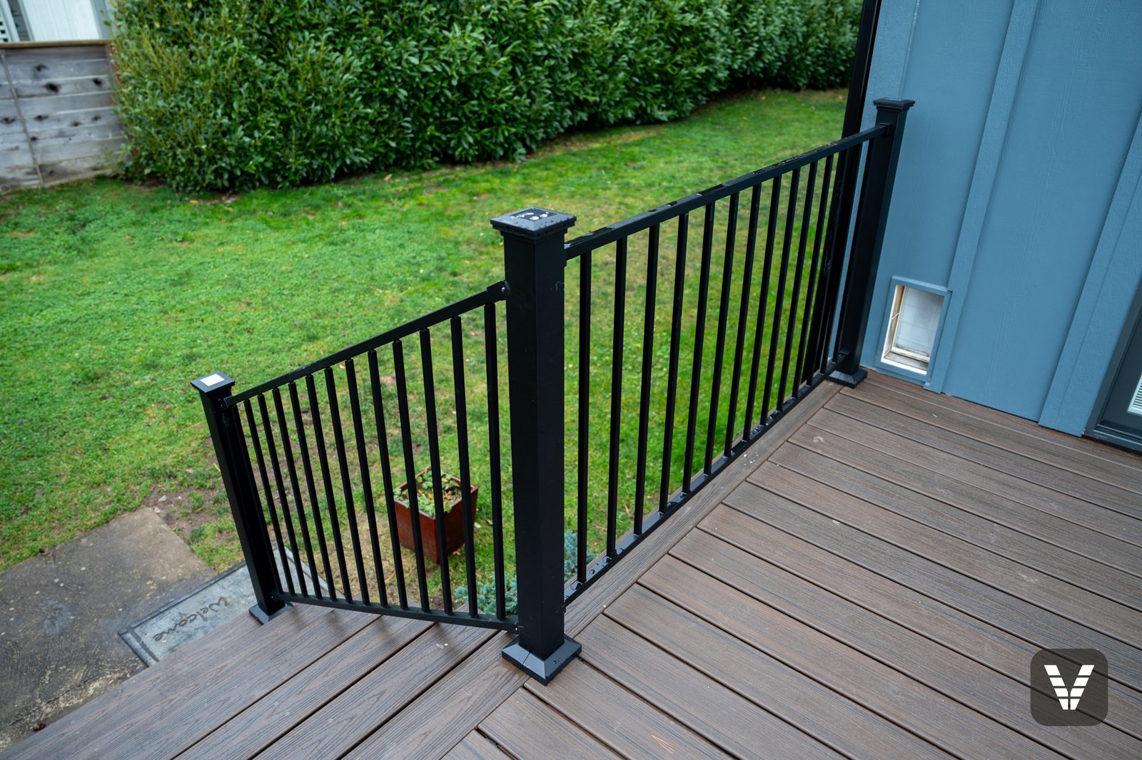 Powder-coated steel railing detail over Trex Transcend decking