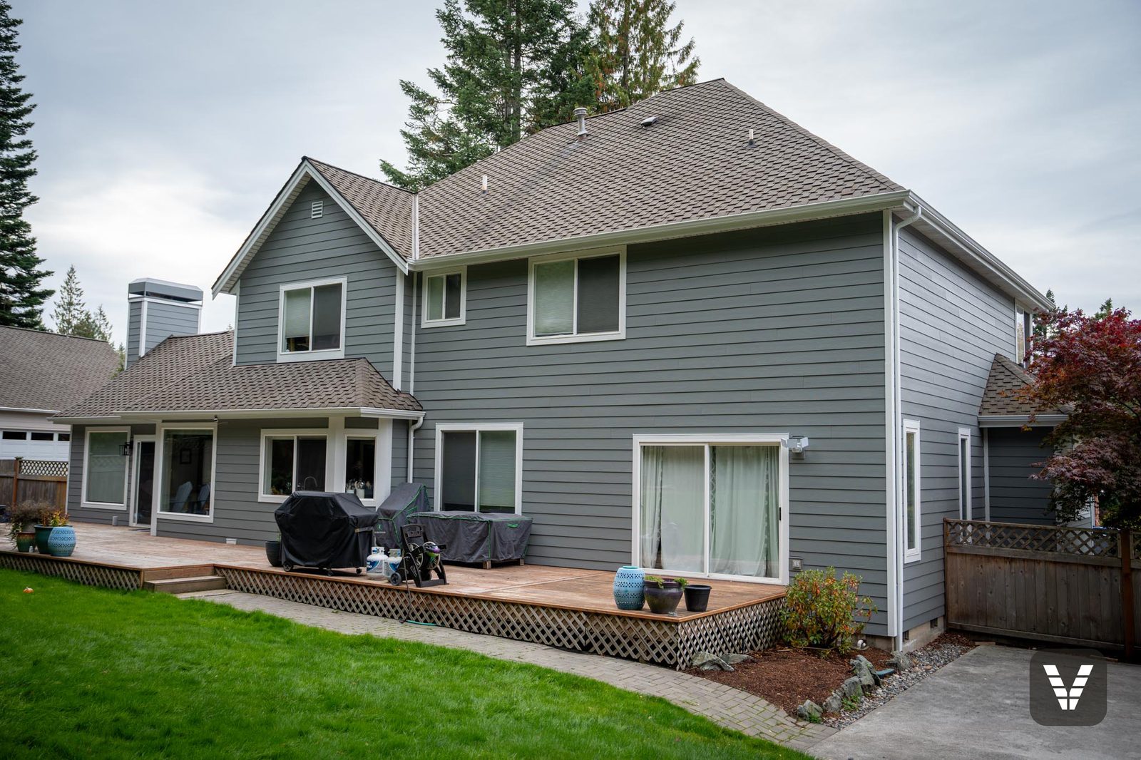 The finished view — rear & patio doors — Siding & Window Vault project in Anacortes, WA