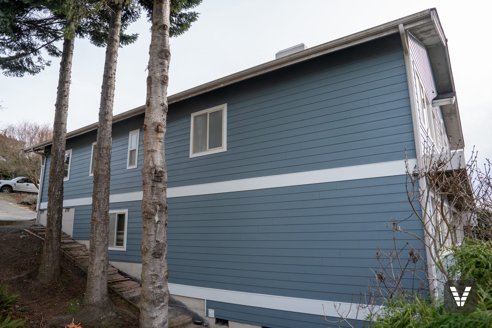 The long north wall in fresh lap with its white band line