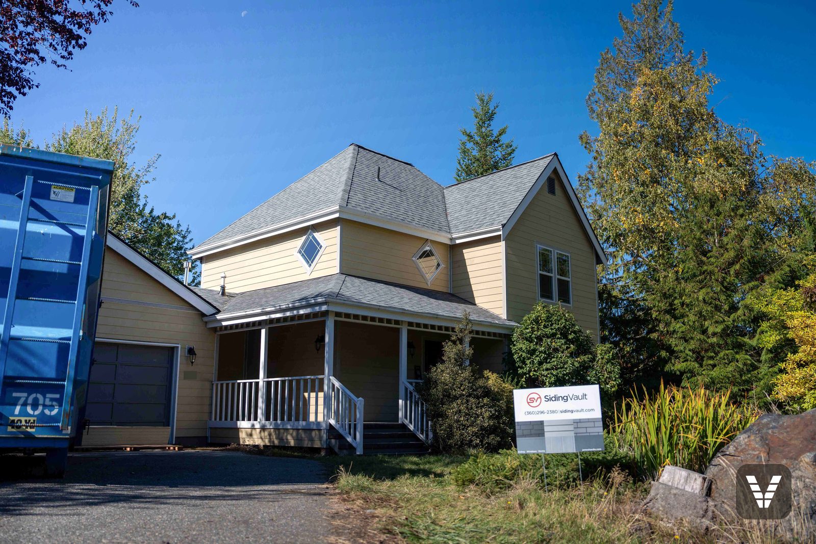 The finished view — front & porch — after shown in factory primer, pre-paint