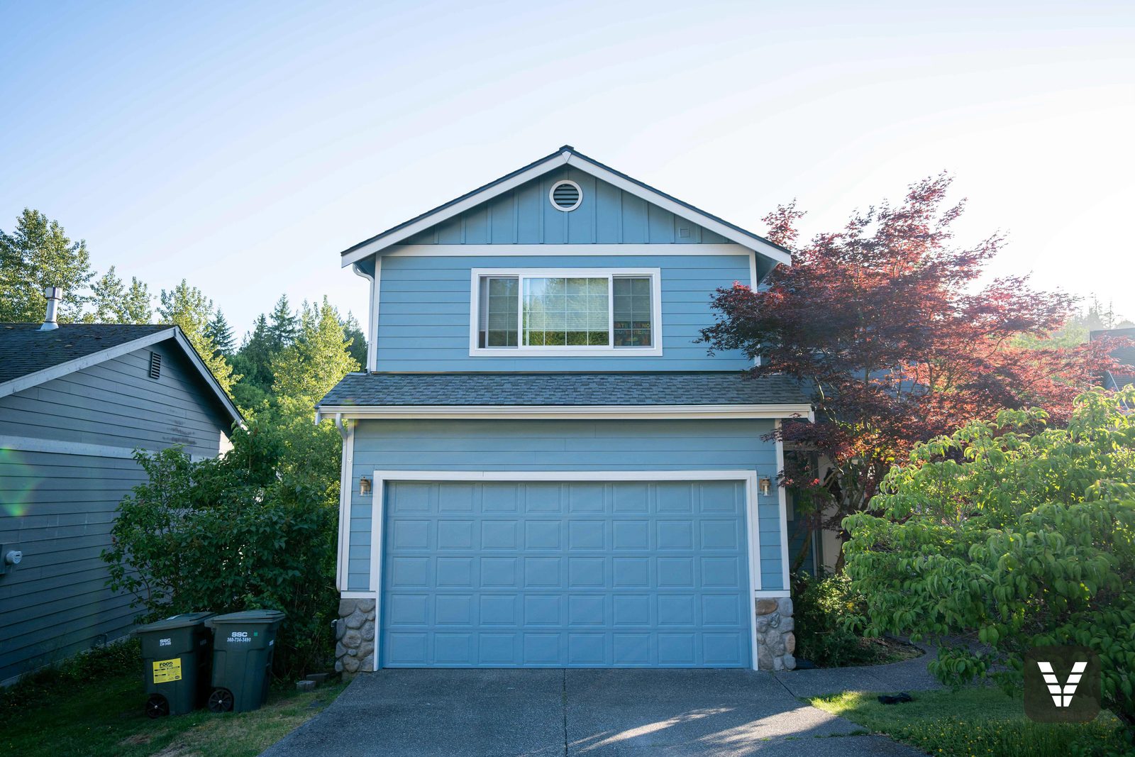 Bellingham re-side painted on site in soft blue with crisp white trim