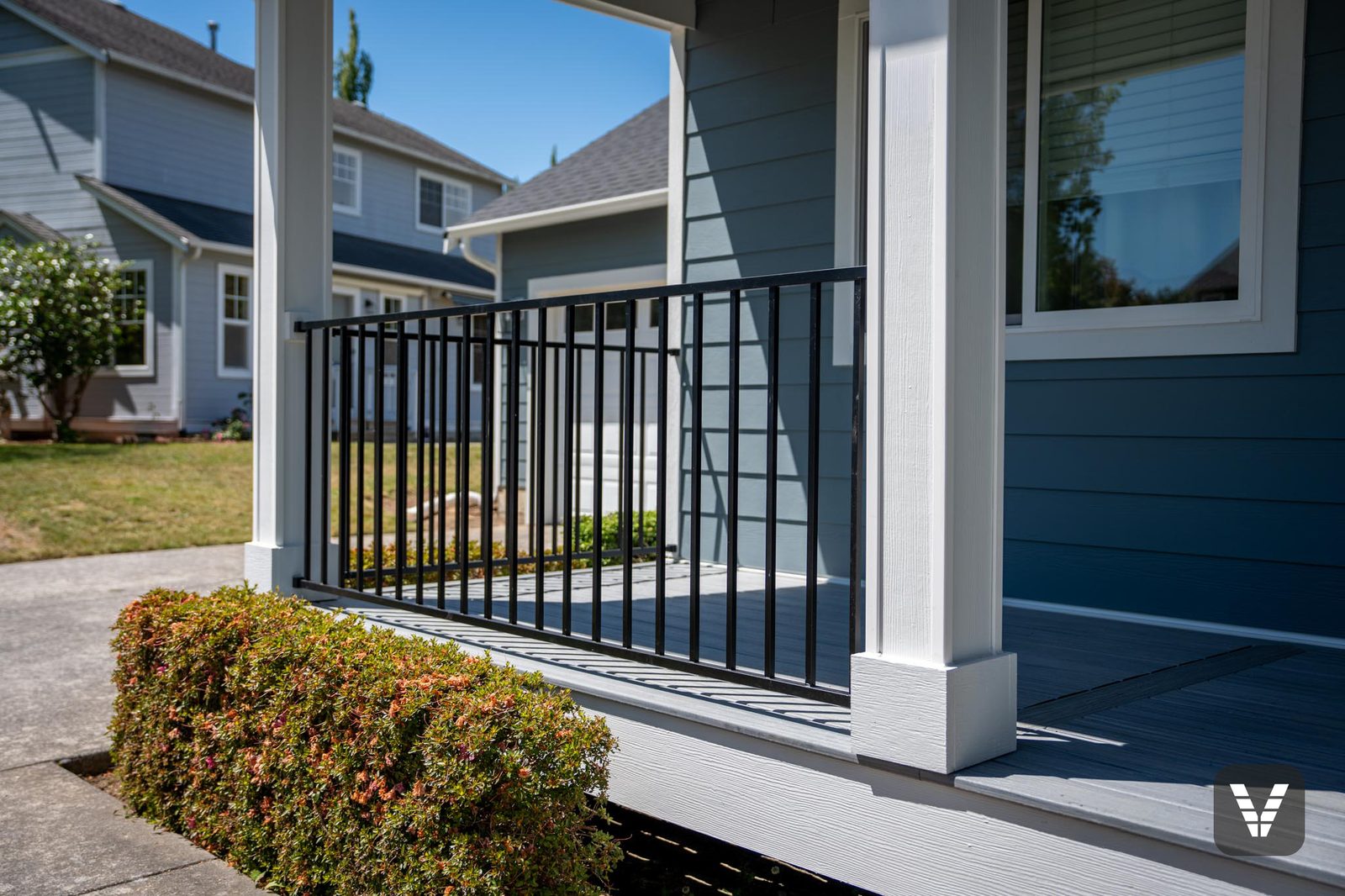 Porch columns re-wrapped in pre-finished HardieTrim in Ferndale — the level of detail Elite certification checks