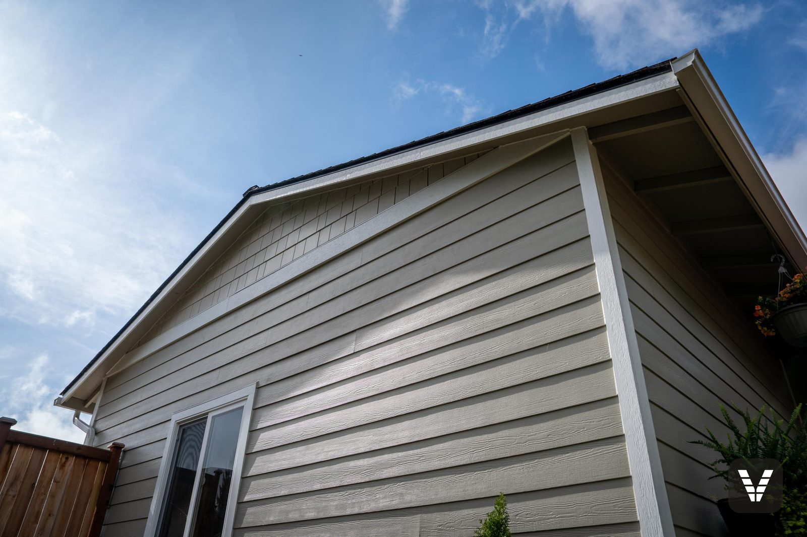 Looking up the gable — shingle texture and crisp trim lines