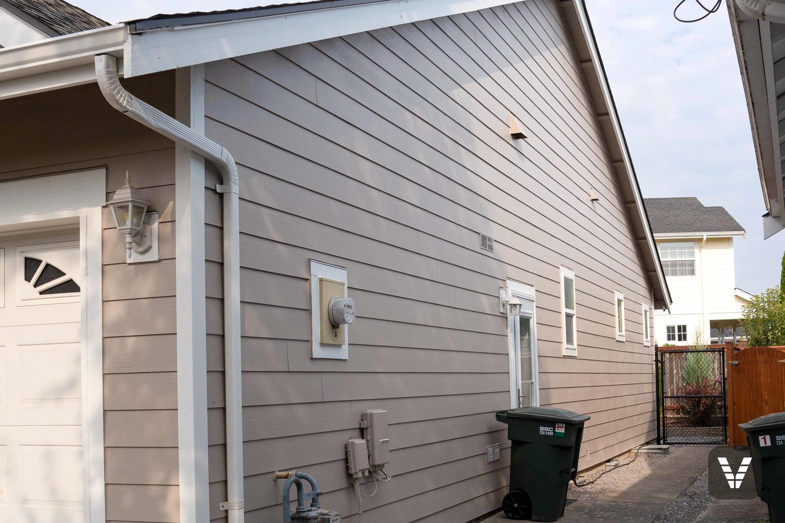 The long side wall — Cedarmill texture under an even two-coat sprayed finish